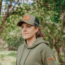 Load image into Gallery viewer, Ethos Badge Trucker Hat in Olive